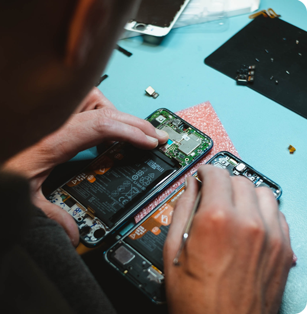 a person fixing a phone